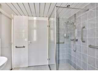 frameless-hinged-shower-doors-panels-for-a-sleek-bathroom-look-small-0