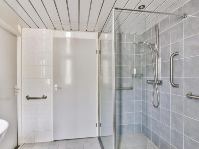 frameless-hinged-shower-doors-panels-for-a-sleek-bathroom-look