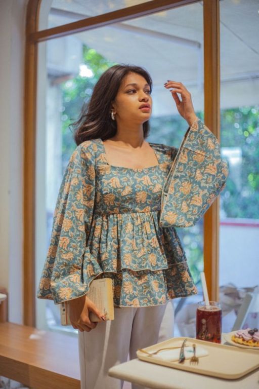 cute-green-floral-peplum-top-with-bell-sleeves-by-odhanon-big-0