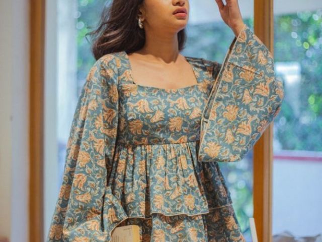 cute-green-floral-peplum-top-with-bell-sleeves-by-odhanon