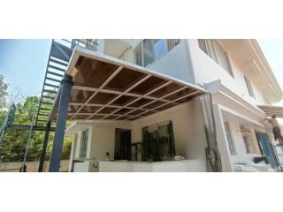 how-metal-pergola-with-roof-systems-improve-outdoor-durability-small-0