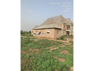 Half Plot of Land with 2Bdr and a Dwarf Fence For Sale at Ogun (Call 08134016132)