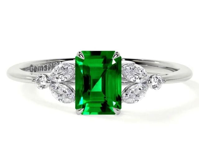 affordable-luxury-emerald-green-ring-with-side-diamonds