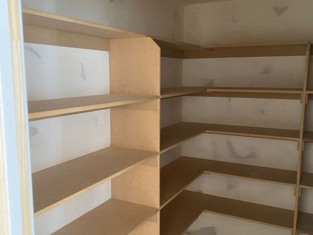 built-in-shelving-carpenter-at-home-custom-storage-design