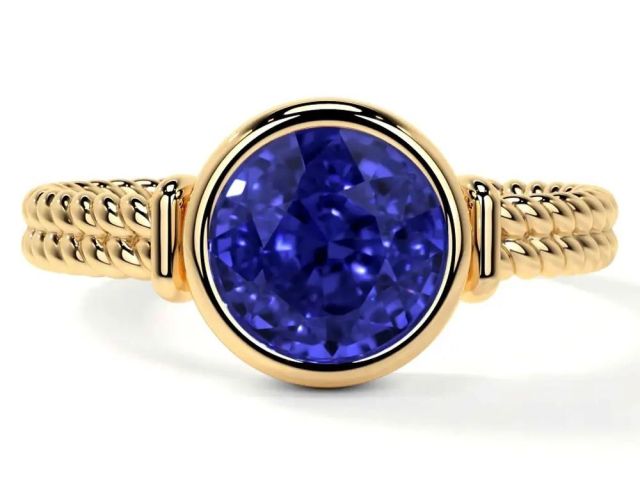 beautiful-tanzanite-engagement-rings-with-bezel-set-style