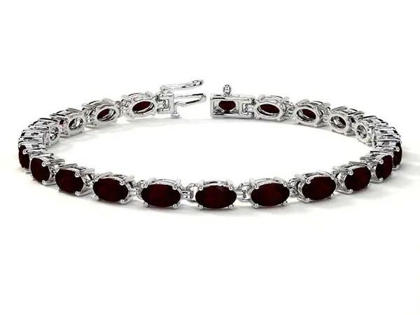 shop-ruby-tennis-bracelet-oval-ruby-bracelet-14k-white-gold
