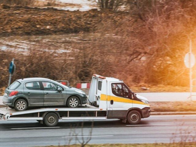 reliable-flatbed-towing-in-orlando-adam-towing-recovery