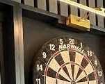 sleek-appeal-with-contemporary-dartboard-cabinet