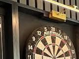 sleek-appeal-with-contemporary-dartboard-cabinet