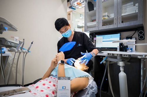 how-does-a-houston-dentist-perform-a-fluoride-treatment-big-0