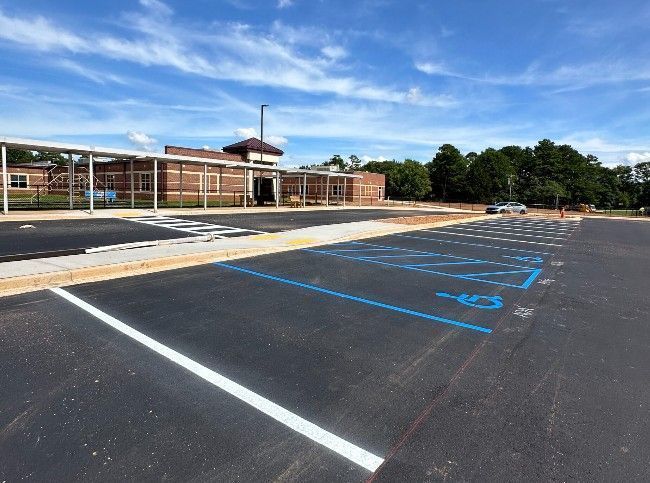 asphalt-crack-filling-greenville-sc-hlc-asphalt-sealcoating-big-0
