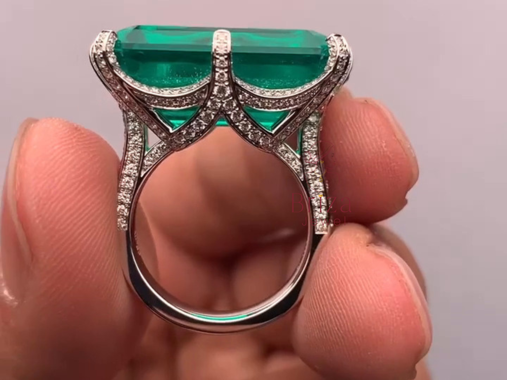 art-deco-engagement-ring-with-emerald-cut-green-gemstone-big-1
