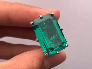 art-deco-engagement-ring-with-emerald-cut-green-gemstone-small-0