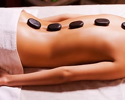 relaxing-hot-stone-massage-therapy-at-contour-day-spa