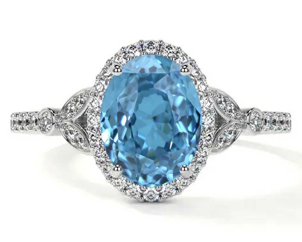 oval-swiss-topaz-custom-engagement-rings-with-round-diamonds