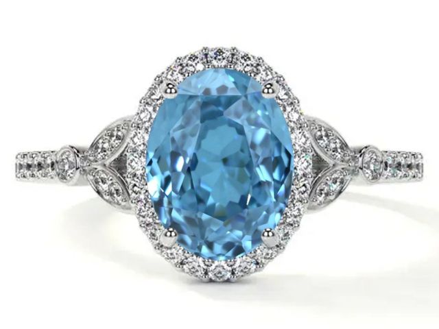 oval-swiss-topaz-custom-engagement-rings-with-round-diamonds