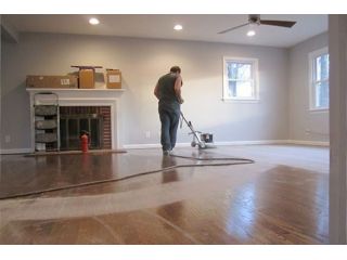 affordable-hardwood-refinishing-for-damaged-floor-repair-small-0