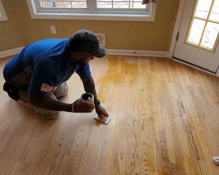 restore-floor-shine-with-wood-floor-recoating-service-today