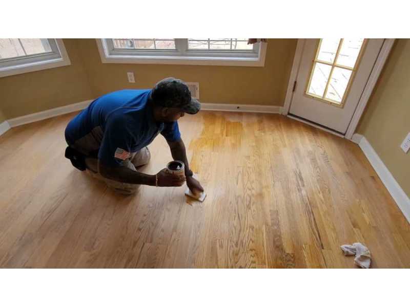 restore-floor-shine-with-wood-floor-recoating-service-today-small-0