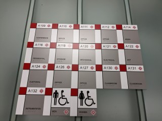 Ensure Inclusion with Clear & Compliant Braille Room Signs by ALTIUS Graphics