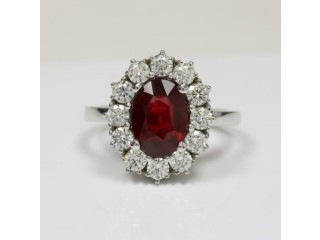 Stunning Oval Cut Ruby Prong Set Halo Ring With Round Diamonds (3.01cttw)